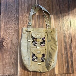 Purse/Bag Brown with purple flowers on the inside and pockets